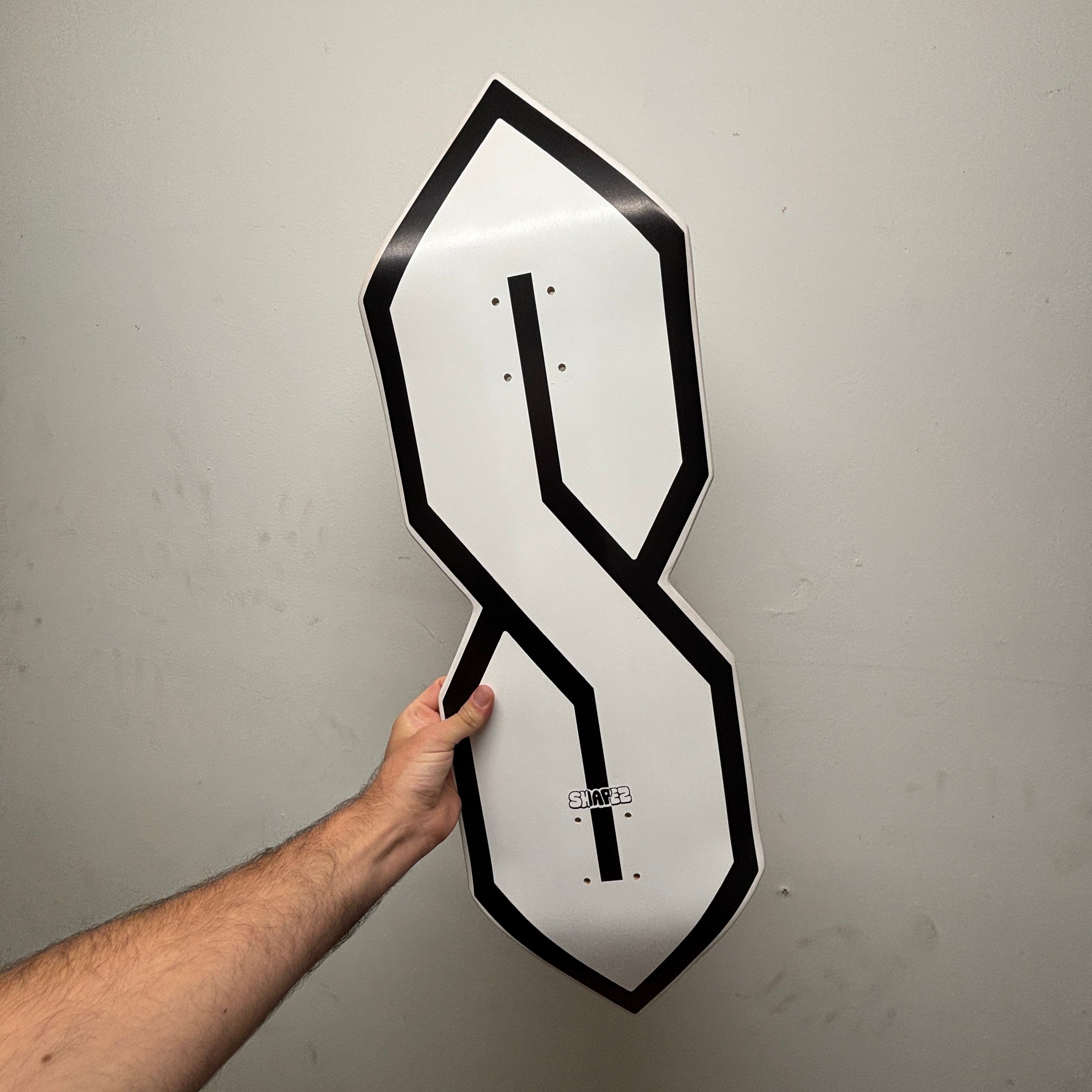 S shaped skateboard deck white outline